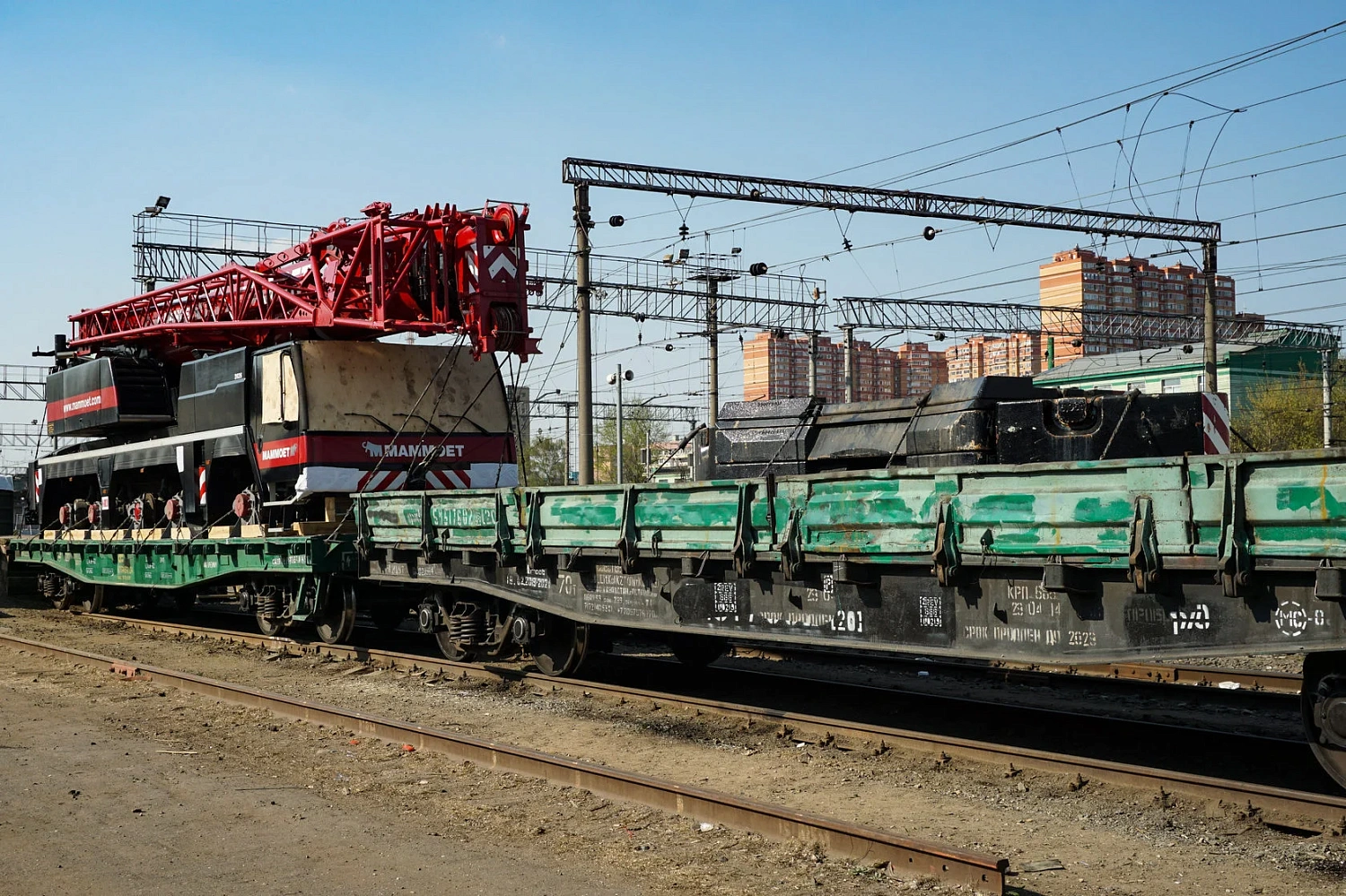 ЖД перевозка автокрана Liebherr LTM 1130 на двух универсальных платформах